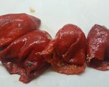Foto del paso 3 de la receta Pimientos rellenos de bacalao con salsa de tomate y pimientos