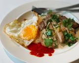 A picture of step 5 of Grilled pork loin served with rice & fried egg.