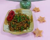 A picture of step 4 of Bitter gourd with onion masala.