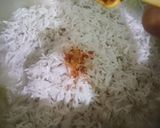 A picture of step 13 of Spicy BBQ chicken ricewith stir fry vegetables.