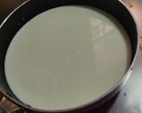A picture of step 1 of Mango malai kulfi.