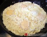 A picture of step 5 of Eggs cooked with feta cheese.