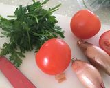 A picture of step 1 of Tomato & Onion Salad.