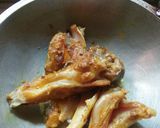 A picture of step 1 of Fish head curry with tomato.