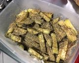 Une image de l'étape 6 de Frites d'aubergines au four aux herbes de Provence et épices.