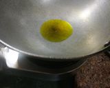 A picture of step 2 of Stuffed Brinjal in tamarind spices.