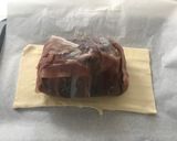 A picture of step 9 of Beef wellington.