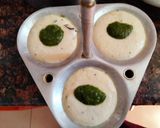 A picture of step 4 of , Chutney and tomato ketchup filled idli.