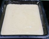 Foto del paso 6 de la receta Bizcocho de café, nata y almendra 