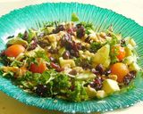 A picture of step 6 of Summer Salad – Wild rice with veggies, nuts, and cranberries.