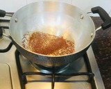 A picture of step 2 of Chilli and grapes Pickle.