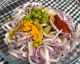 A picture of step 2 of Onion Pakoda.