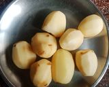 A picture of step 1 of Kashmiri Aloo Dum.