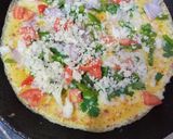 A picture of step 3 of Bread sliced cheese omelette.