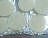 A picture of step 4 of Idli-Pizza bites.