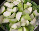 Hình bước làm 3 của món Canh Mướp Mồng Tơi Tôm Khô Húng Quế