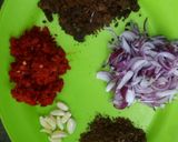A picture of step 1 of RICE & BEANS WITH DADDAWA(Locust Beans).
