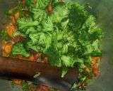 A picture of step 2 of Macaroni with baked beaf and steam spinach with brocolli.