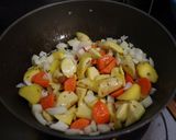 A picture of step 4 of Braised Pork belly and sweet potato with tomato.