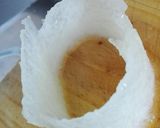 Foto del paso 4 de la receta Anillos de Casaba helados y rellenos de arándanos