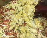 A picture of step 14 of Chicken vegetable roll.
