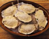Une image de l'étape 11 de Huitres Gratinées à la Sauce Vin Blanc.