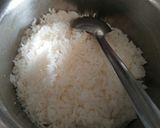 A picture of step 1 of Hriyala Pulao With Mint Raita.