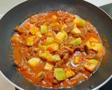A picture of step 3 of Spiced Tomato Beef Stew.