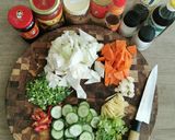 A picture of step 1 of Spicy cabbage, carrot and cucumber pickle.