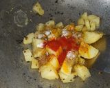 A picture of step 1 of Butter masala sesame potato.