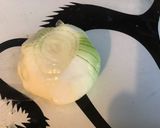 Une image de l'étape 3 de Tomates noires farcies à l élan,oignon et carotte,couronne de poireaux.