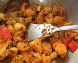 A picture of step 3 of Gobhi Matar Curry.
