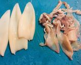 Foto del passaggio 2 della ricetta Calamari e carciofi saltati in padella