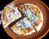 A picture of step 5 of Veg cheese Pizza.