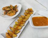 A picture of step 5 of Crispy potato wedges with spicy mango sauce.