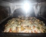 A picture of step 2 of Chicken tikka pizza.