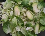 A picture of step 2 of 7 layer Salad.