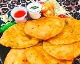 A picture of step 12 of Masaledar aloo puri.