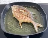 A picture of step 1 of Fried Shortfin Pompano with Crispy Garlics.