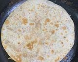 A picture of step 5 of Quesadilla (with few drops of oil and food turns delicious).