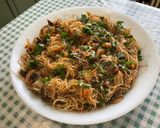 Une image de l'étape 14 de Nouilles de riz sautées aux légumes et épices.
