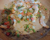 Foto del paso 5 de la receta: Pimiento rojo asado relleno de gambas con crema de gambas