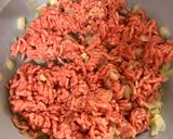 Foto del paso 2 de la receta: Pimientos rojos rellenos de arroz y carne