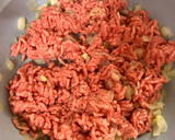 Foto del paso 2 de la receta: Pimientos rojos rellenos de arroz y carne