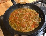 Une image de l'étape 10 de Noix de saint Jacques aux tomates, échalotes, ail et persil.