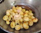 A picture of step 4 of ALOO DO PYAZA..