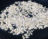 A picture of step 1 of Roasted sunflower seeds & other seeds spiced jaggery brittle.