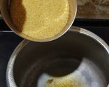 A picture of step 1 of Sindhi Bhatt. (sweet broken wheat).