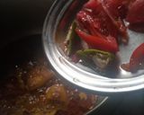 A picture of step 5 of Aloo chane ki tahiri.