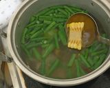 Foto langkah ke 3 dari resep Sayur Asem Daun Lembayung, Jagung, dan Pedoyo.